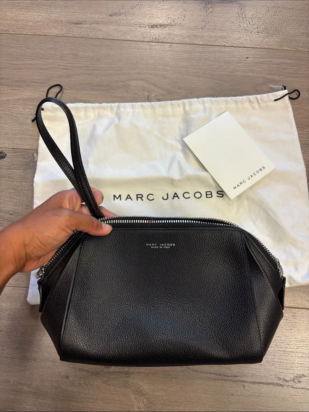 Marc Jacobs Black Pebbled clutch Wrist Strap